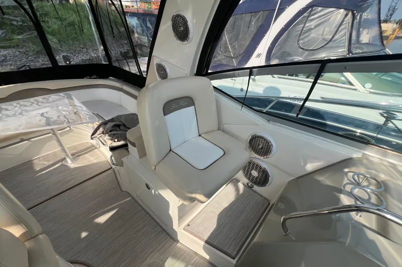  Yacht Photos Pics Interior of 2012 Sea Ray 370 Sundancer boat with seating and table.