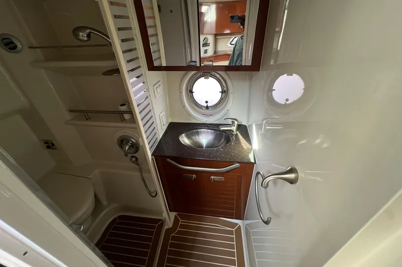  Yacht Photos Pics Luxurious bathroom in 2012 Sea Ray 370 Sundancer yacht with modern fixtures.