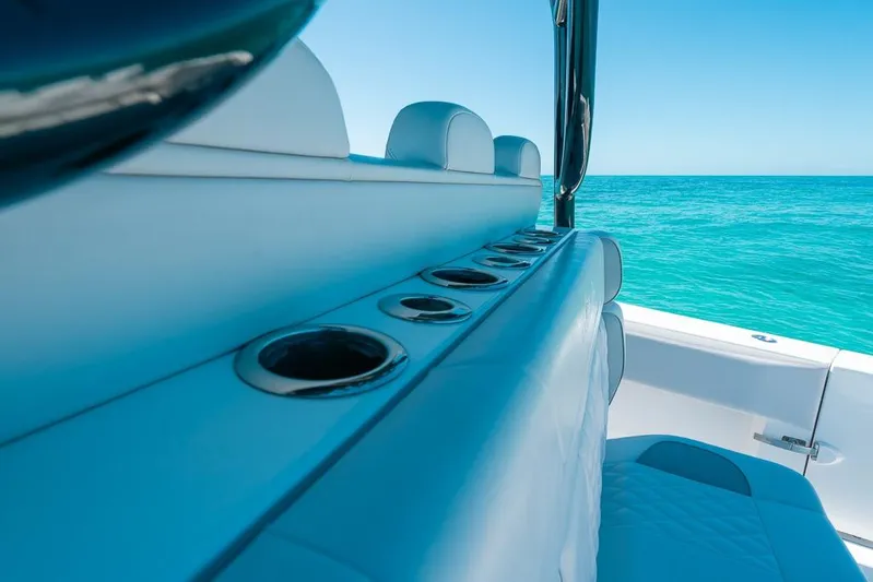  Yacht Photos Pics 2024 SeaHunter 39 Tournament boat interior with ocean view, featuring rod holders.