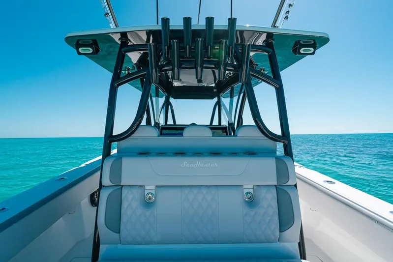  Yacht Photos Pics 2024 SeaHunter 39 Tournament boat interior with ocean view, featuring sleek seating and modern design.