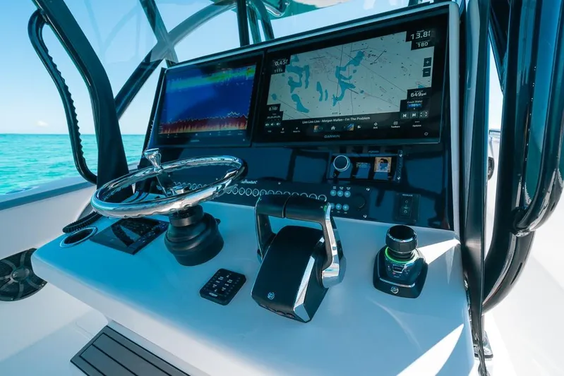  Yacht Photos Pics 2024 SeaHunter 39 Tournament helm with advanced navigation and control systems on open water.