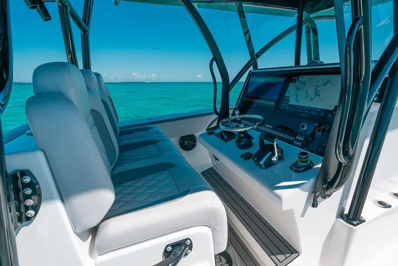  Yacht Photos Pics 2024 SeaHunter 39 Tournament boat interior with advanced navigation system and luxurious seating.