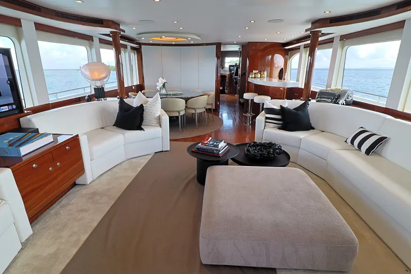  Yacht Photos Pics Luxurious interior of 2013 Cheoy Lee Bravo yacht with elegant seating and ocean views.