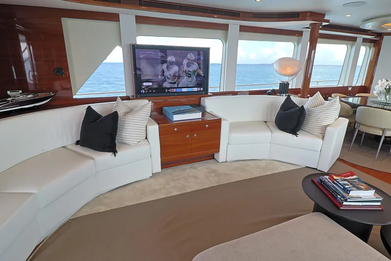  Yacht Photos Pics Luxurious 2013 Cheoy Lee Bravo yacht interior with elegant seating and ocean view.