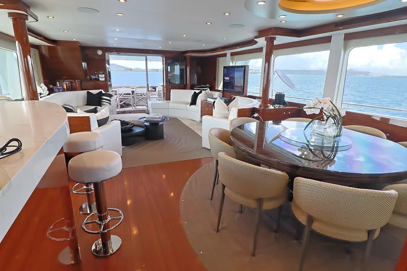  Yacht Photos Pics Luxurious interior of 2013 Cheoy Lee Bravo yacht with elegant seating and ocean views.