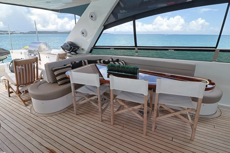  Yacht Photos Pics Luxurious 2013 Cheoy Lee Bravo yacht deck with seating and ocean view.