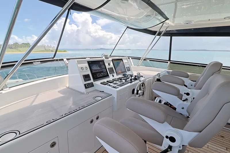  Yacht Photos Pics 2013 Cheoy Lee Bravo yacht helm with modern controls and ocean view.