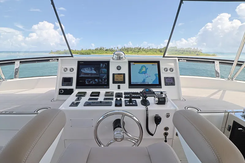  Yacht Photos Pics Helm of 2013 Cheoy Lee Bravo yacht with navigation screens and ocean view.