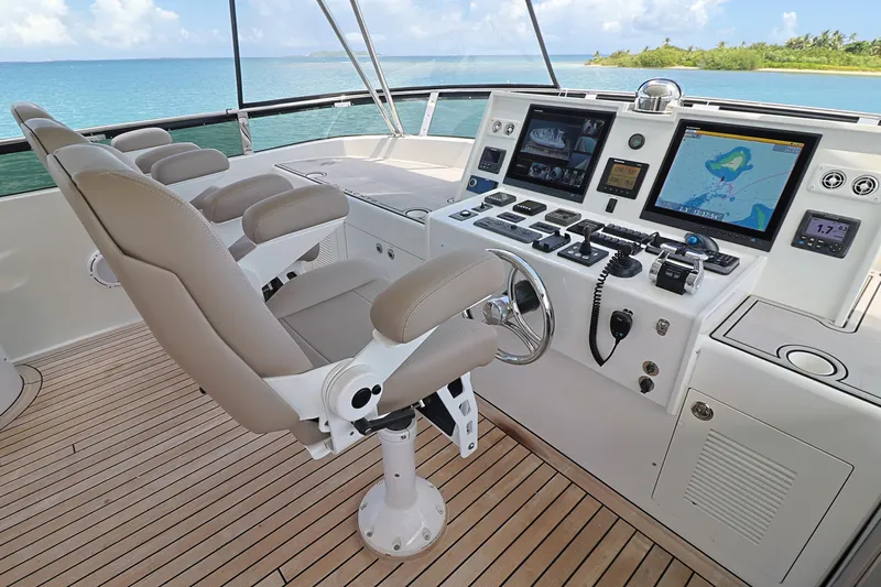  Yacht Photos Pics Helm of 2013 Cheoy Lee Bravo yacht with modern navigation equipment and ocean view.