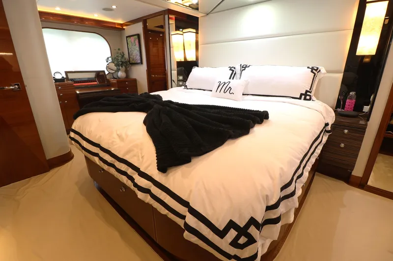  Yacht Photos Pics Luxurious bedroom interior of 2013 Cheoy Lee Bravo yacht with elegant bedding and decor.