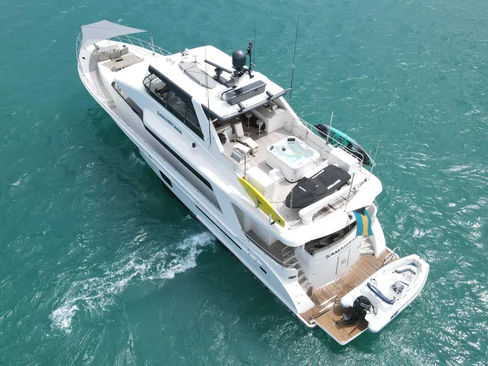  Yacht Photos Pics Luxury 2013 Cheoy Lee Bravo yacht cruising on turquoise waters.