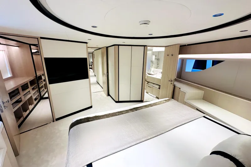 Optimism Yacht Photos Pics Luxurious interior of 2023 Majesty 120 yacht, featuring modern design and elegant furnishings.