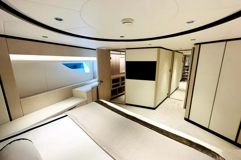 Optimism Yacht Photos Pics Luxurious interior of 2023 Majesty 120 yacht, featuring modern design and elegant furnishings.