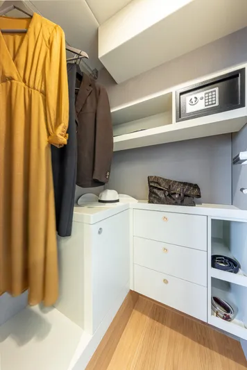Absolute Navetta 64 Yacht Photos Pics Luxury yacht closet with safe, clothing, and accessories on Absolute Navetta 64, 2025 model.