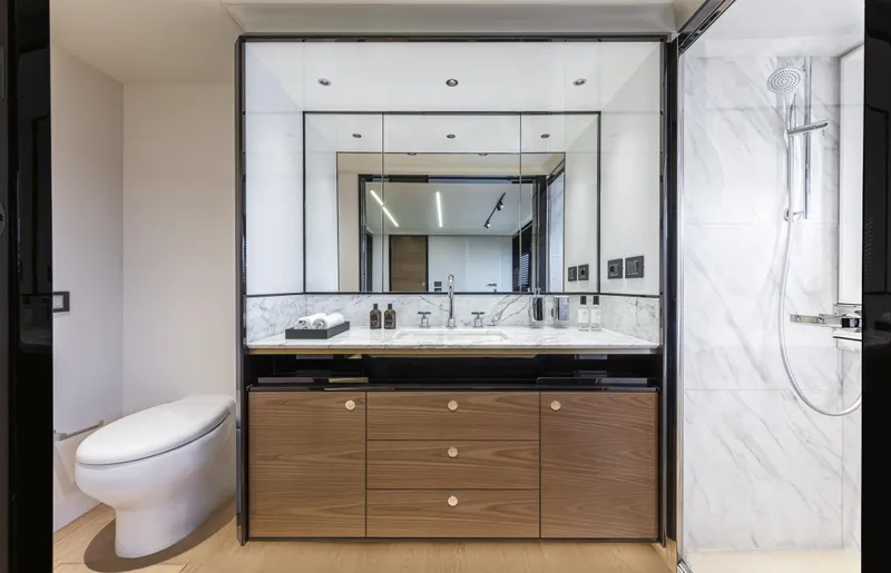 Absolute Navetta 64 Yacht Photos Pics Luxurious bathroom in 2025 Absolute Navetta 64 yacht with modern fixtures and elegant design.