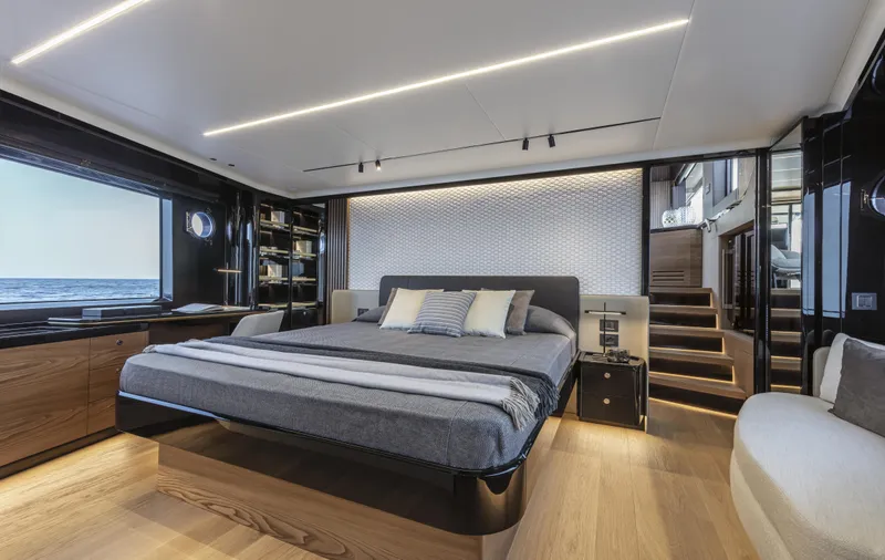 Absolute Navetta 64 Yacht Photos Pics Luxurious bedroom interior on 2025 Absolute Navetta 64 yacht, featuring modern design and ocean view.