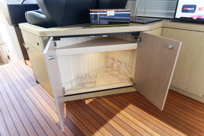  Yacht Photos Pics Open cabinet with glassware on Sunseeker Predator 57 yacht, 2017 model.
