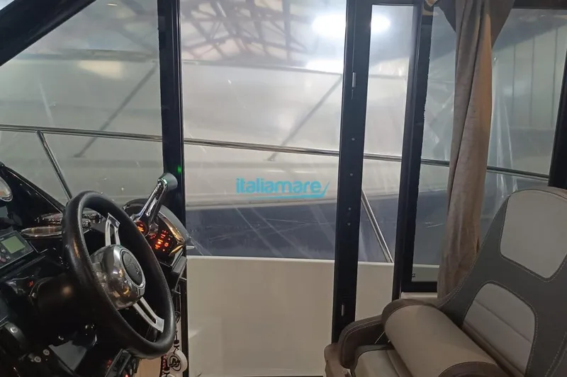  Yacht Photos Pics Interior view of 2019 Jeanneau Merry Fisher 895 boat cockpit.