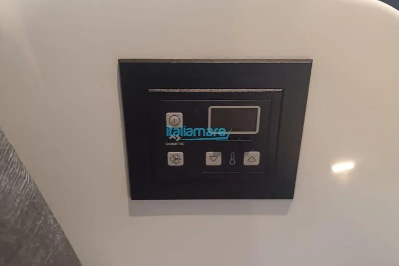  Yacht Photos Pics Control panel on 2019 Jeanneau Merry Fisher 895 boat interior.