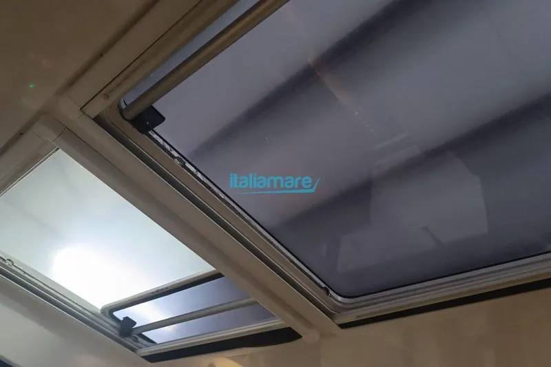  Yacht Photos Pics Interior view of Jeanneau Merry Fisher 895 boat skylight, 2019 model.