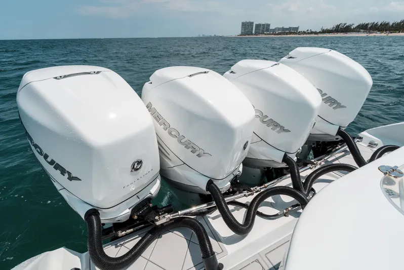  Yacht Photos Pics 2017 Yellowfin 42 boat with four Mercury outboard engines on open water.
