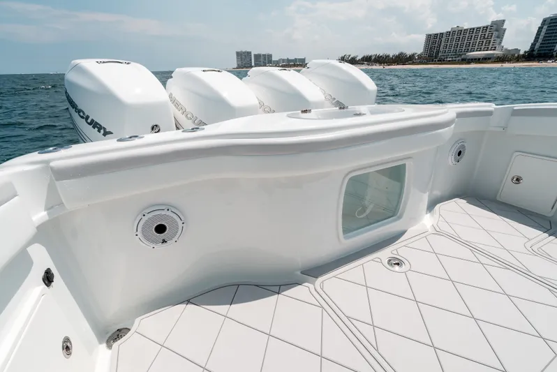  Yacht Photos Pics 2017 Yellowfin 42 boat deck with Mercury engines, ocean view, and modern design.