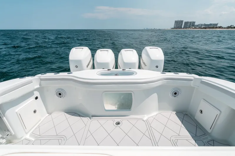  Yacht Photos Pics 2017 Yellowfin 42 boat with four engines on open sea.