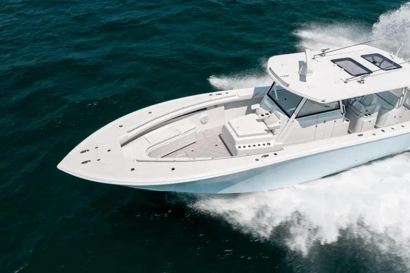  Yacht Photos Pics 2017 Yellowfin 42 boat cruising on open water, showcasing sleek design and performance.