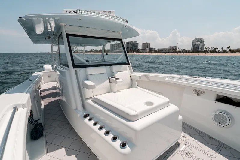  Yacht Photos Pics 2017 Yellowfin 42 boat on water, featuring spacious deck and modern design.