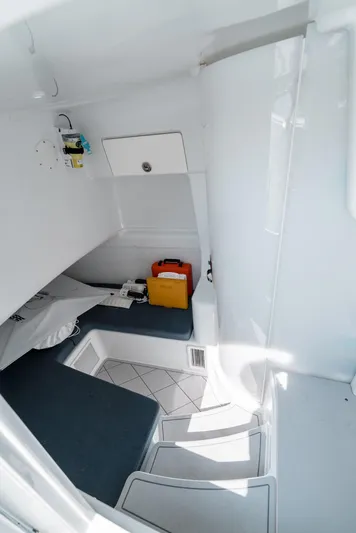  Yacht Photos Pics 2017 Yellowfin 42 interior cabin with seating and storage.