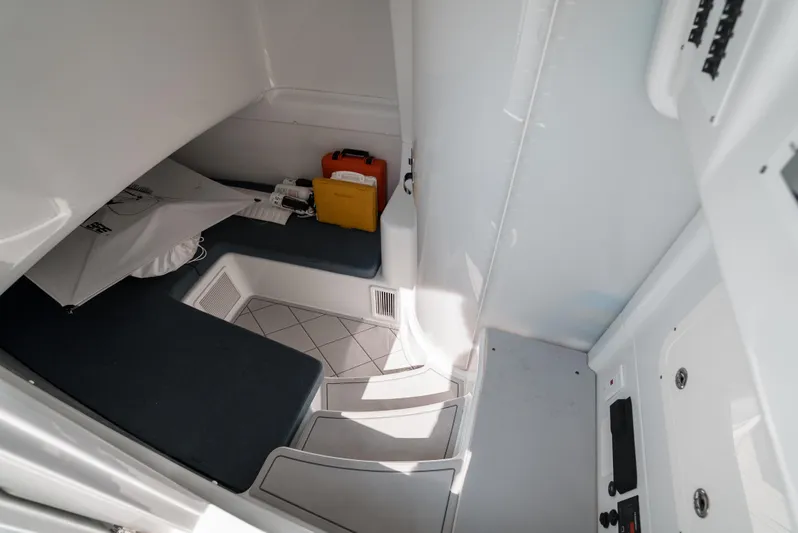  Yacht Photos Pics 2017 Yellowfin 42 interior cabin with seating and storage.