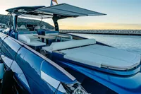 2024 Solaris Power 60 Open yacht docked at sunset, showcasing sleek design and luxury features.