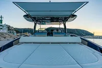 2024 Solaris Power 60 Open yacht with spacious deck at sunset.