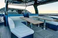 2024 Solaris Power 60 Open yacht with luxurious seating and dining area.