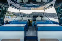 2024 Solaris Power 60 Open luxury yacht interior with modern seating and ocean view.