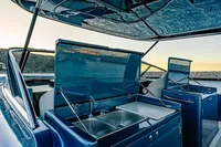 2024 Solaris Power 60 Open yacht with sleek outdoor kitchen setup at sunset.