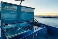2024 Solaris Power 60 Open yacht with sleek outdoor kitchen by the sea.