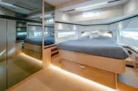 Luxurious bedroom interior of 2024 Solaris Power 60 Open yacht.