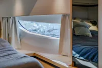 Luxurious interior of 2024 Solaris Power 60 Open yacht cabin with modern design.