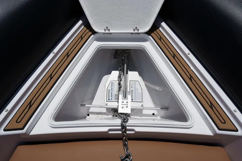 Jilly Bean Yacht Photos Pics Anchor compartment of Airship 340 boat, featuring modern design and secure chain mechanism.