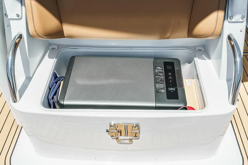 Jilly Bean Yacht Photos Pics Storage compartment in Airship 340 boat, featuring a secure latch and modern design, 2025 model.