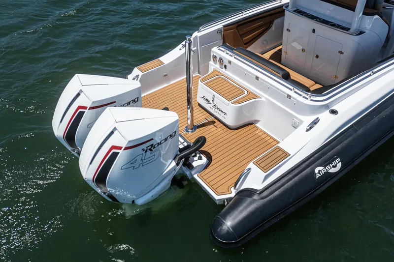 Jilly Bean Yacht Photos Pics 2025 Airship 340 boat with twin racing engines on water.