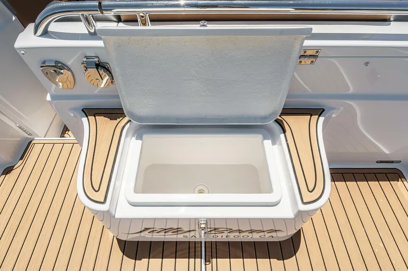 Jilly Bean Yacht Photos Pics Open storage compartment on Airship 340 boat, 2025 model, with teak flooring.