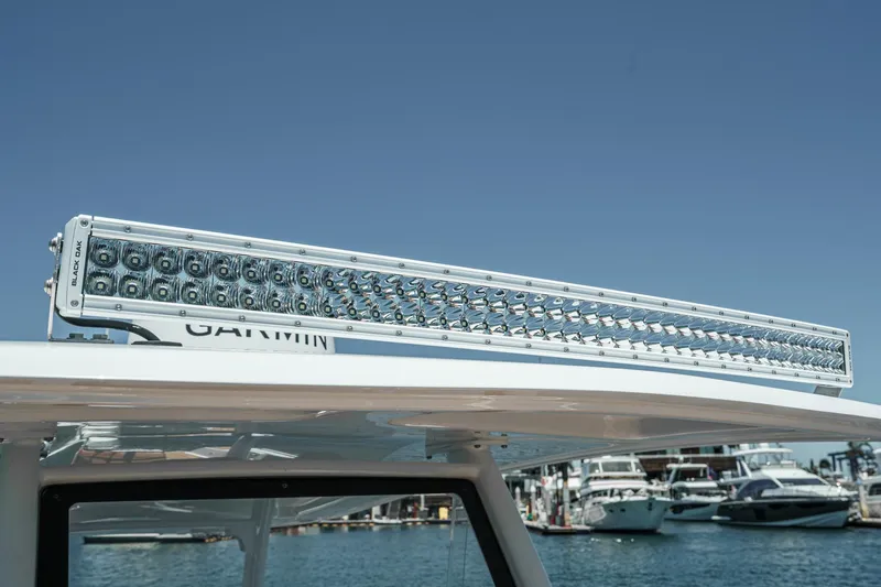 Jilly Bean Yacht Photos Pics LED light bar on Airship 340 boat, 2025 model, with marina background.