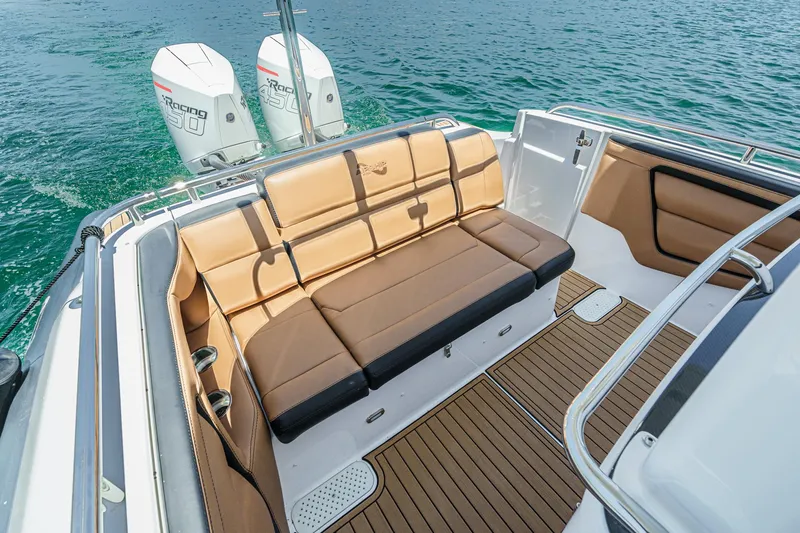 Jilly Bean Yacht Photos Pics Luxury seating on 2025 Airship 340 boat with twin outboard engines, on open water.