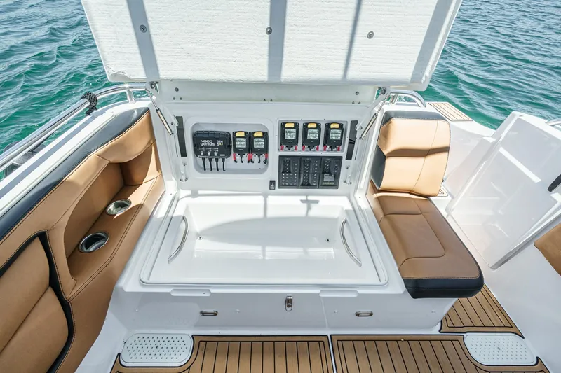 Jilly Bean Yacht Photos Pics 2025 Airship 340 boat interior with control panel and cushioned seating.