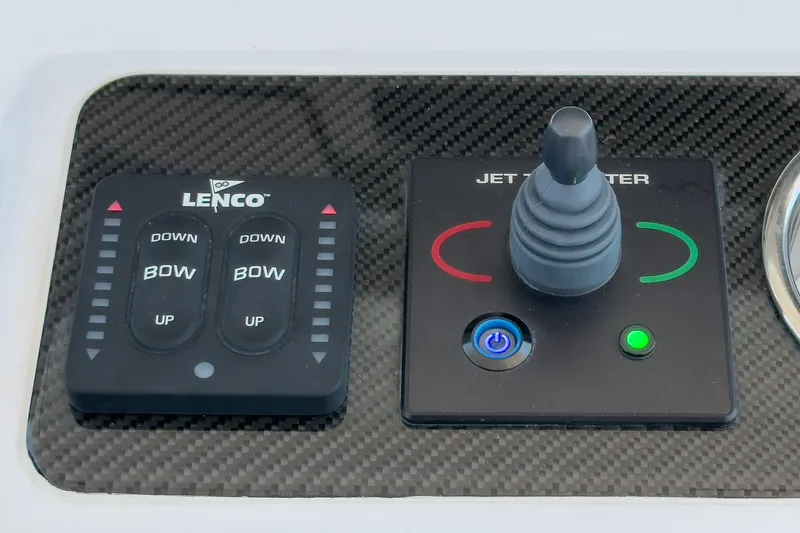Jilly Bean Yacht Photos Pics Control panel of Airship 340, 2025 model, featuring Lenco trim tabs and jet thruster joystick.