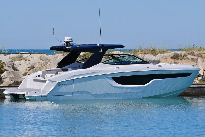  Yacht Photos Pics 2026 Cruisers Yachts 38 GLS I/O in serene marina setting.