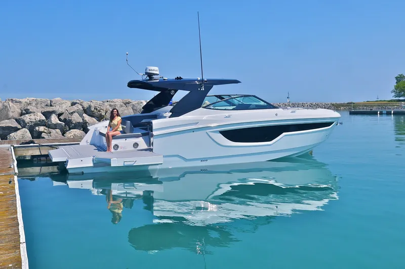  Yacht Photos Pics 2026 Cruisers Yachts 38 GLS I/O docked, featuring sleek design and modern amenities.