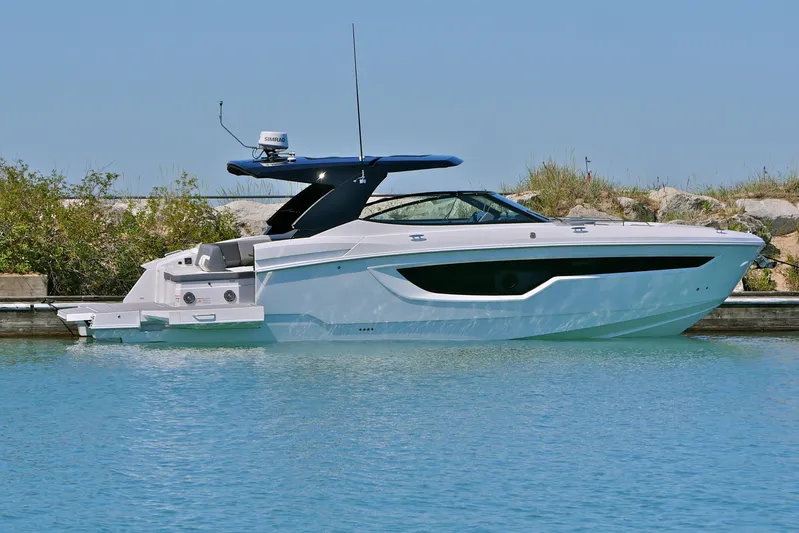  Yacht Photos Pics 2026 Cruisers Yachts 38 GLS I/O in serene waters, showcasing sleek design and luxury.